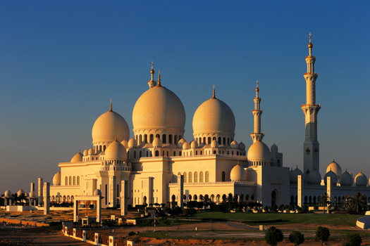 Sheikh Zayed Grand Mosque in sunset with blue sky