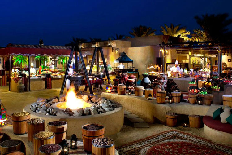 Restaurant in Bab Al Sham resort at night