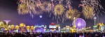 Night image of the Global Village Dubai with firework