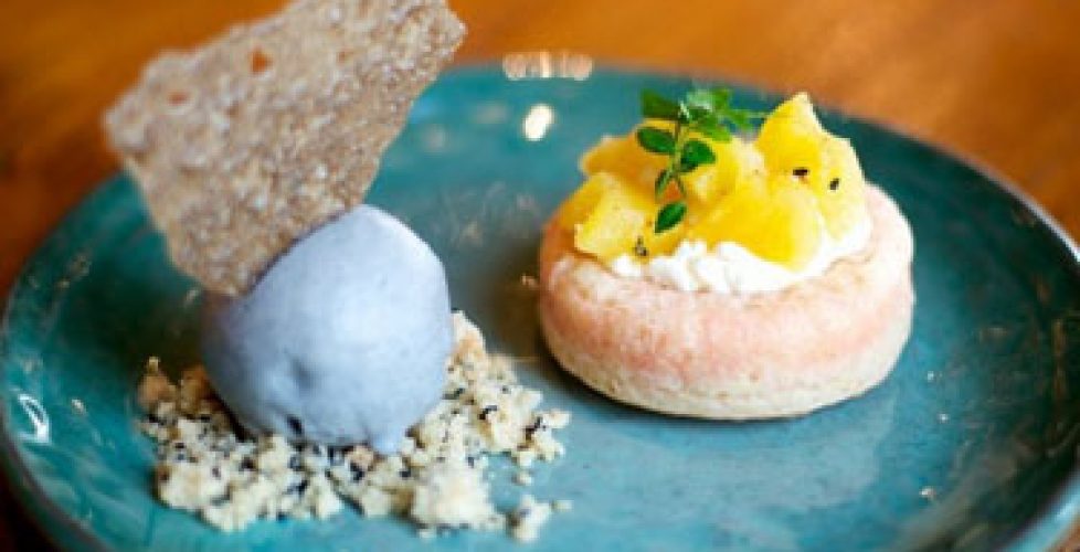 Pink and blue rice cake on a blue plate