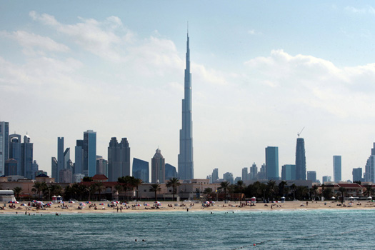 Burj Khalifa and other tall buildings from the beach in Dubai