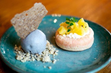 Pink and blue rice cake on a blue plate