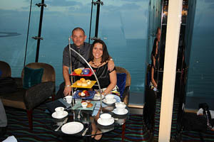 Demeter Laci A couple is eating high tea in a hotel